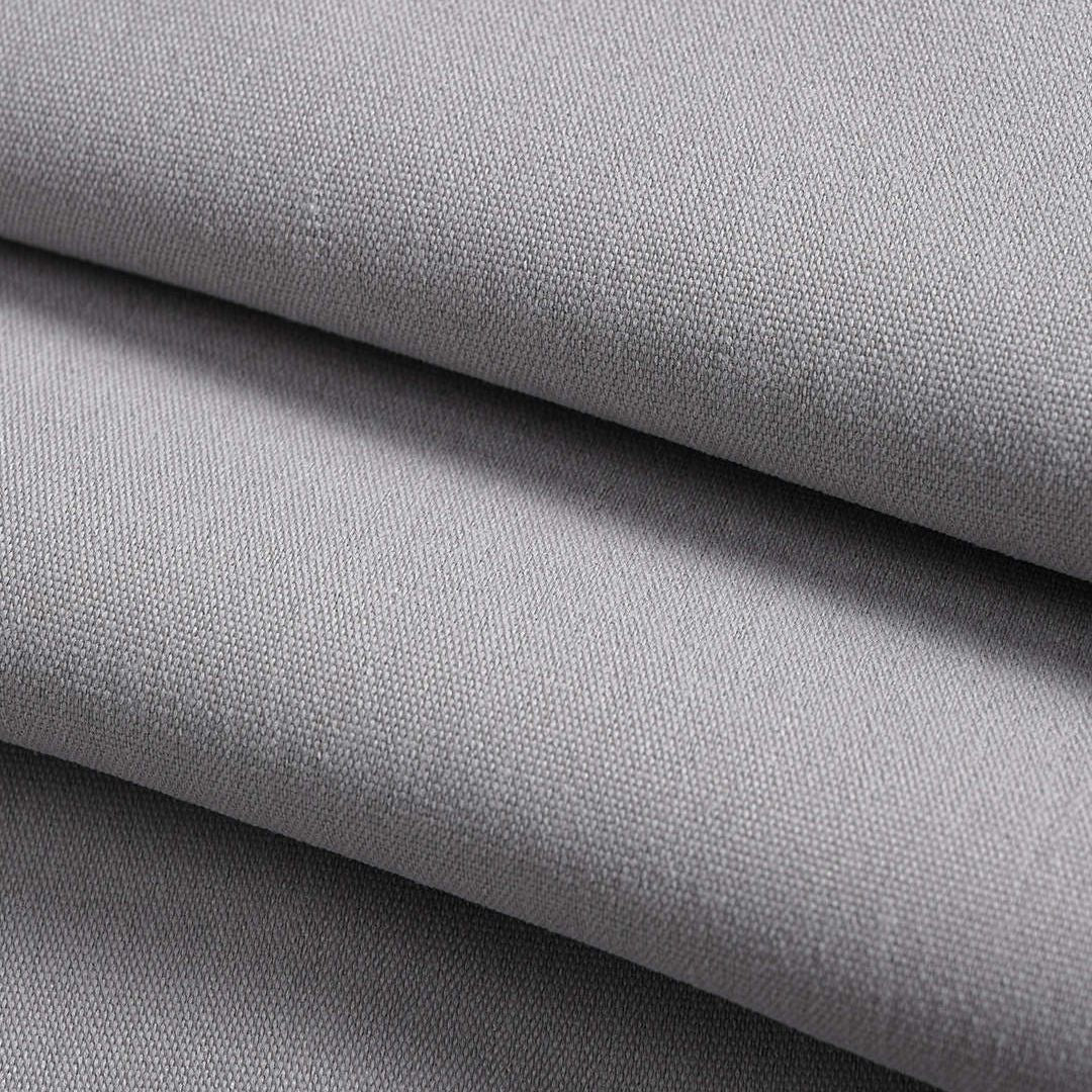 Grå figursydd skjortblus med voluminösa ballongärmar och knappar framtill