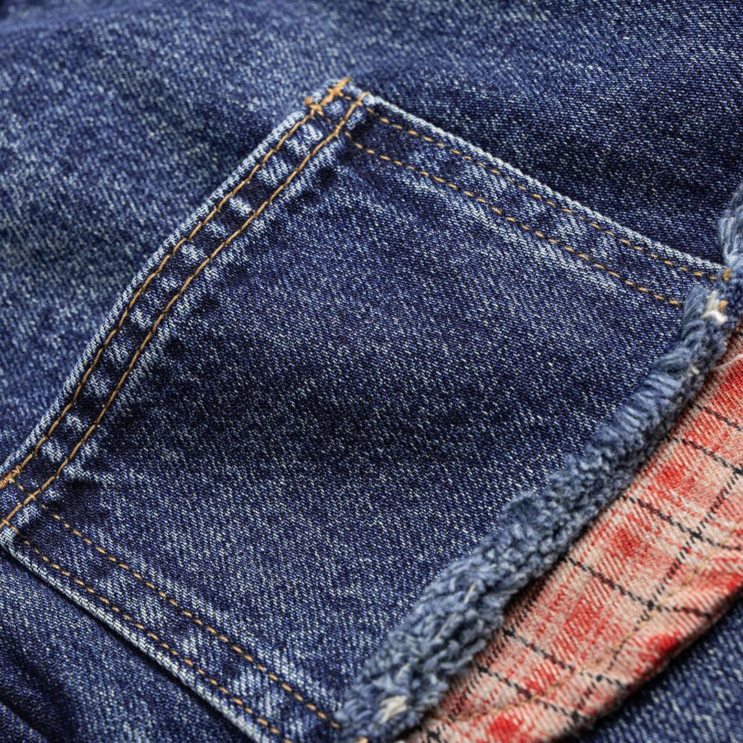 Denimbyxor med dubbel midja och exponerade rutiga flanellfickor