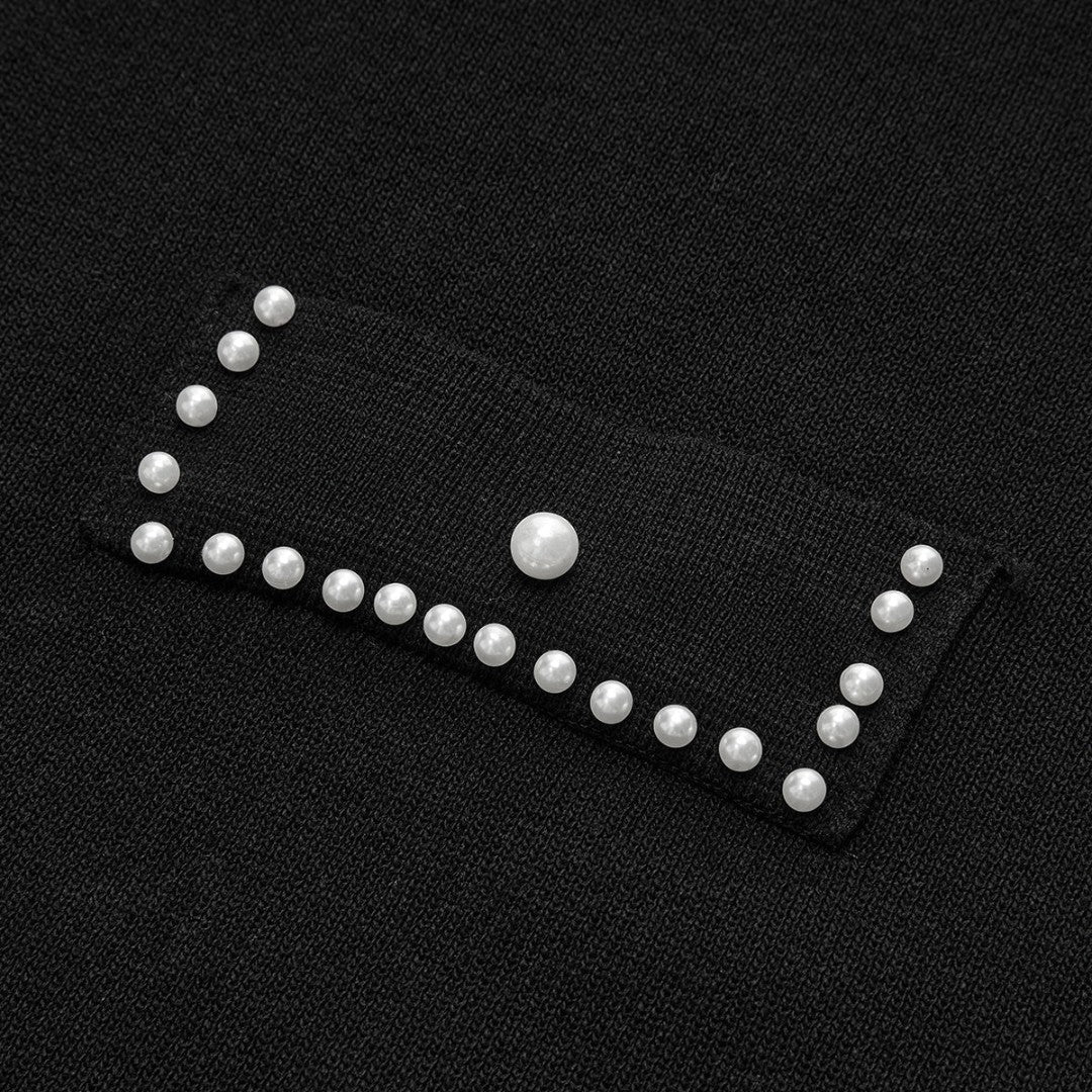 Svart Stickad midiklänning med pärldetaljer och plisserad kjol