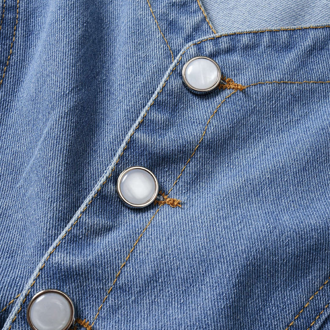 Figursydd denimväst med framfickor och knappstängning