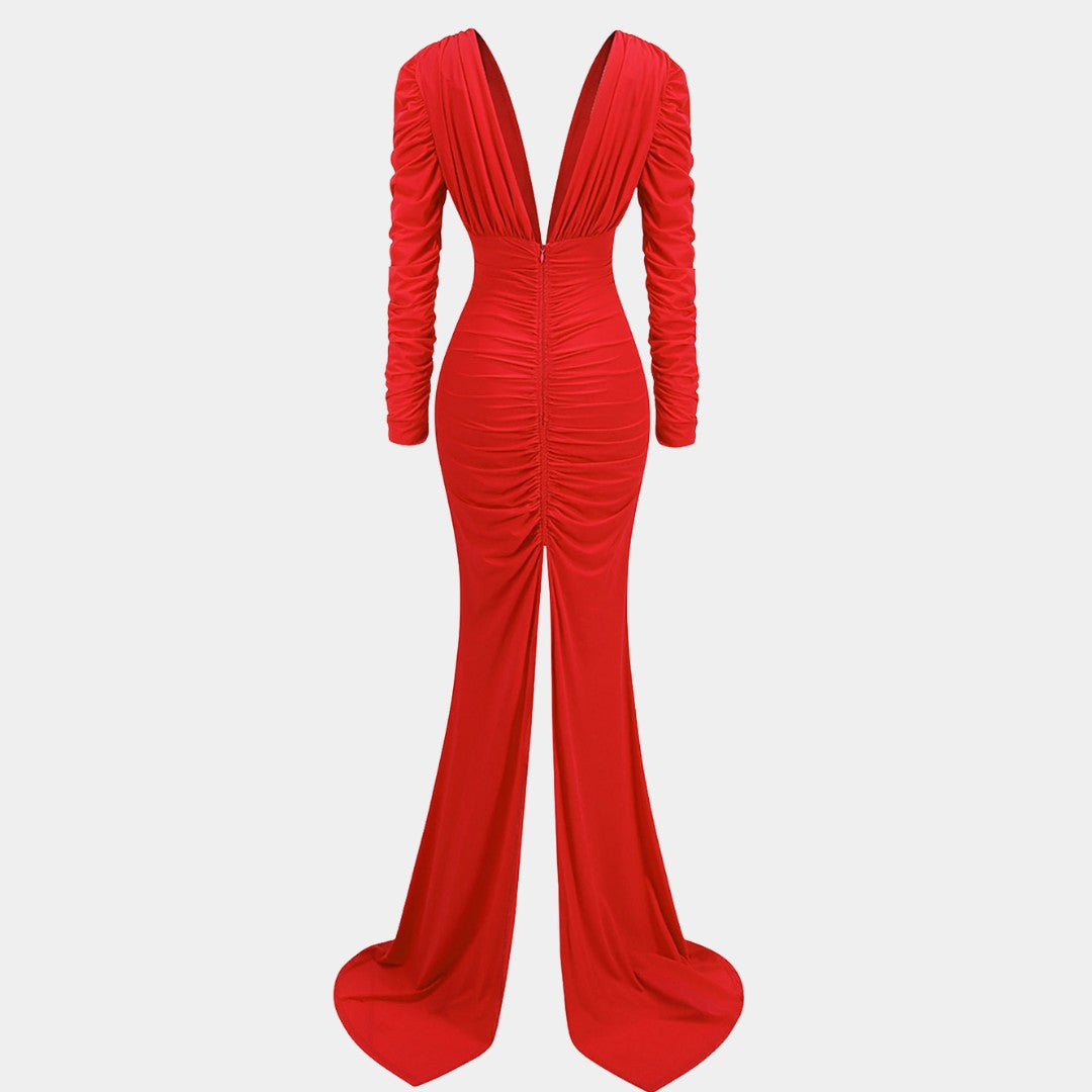 Golvlång stretchig maxiklänning i jersey med djup V-ringning, rynkdetaljer och långa ärmar