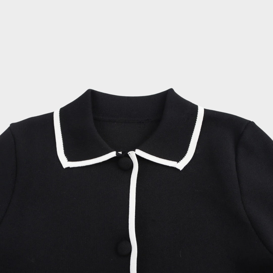 Elegant svart tvådelad stickad set med kofta och minikjol