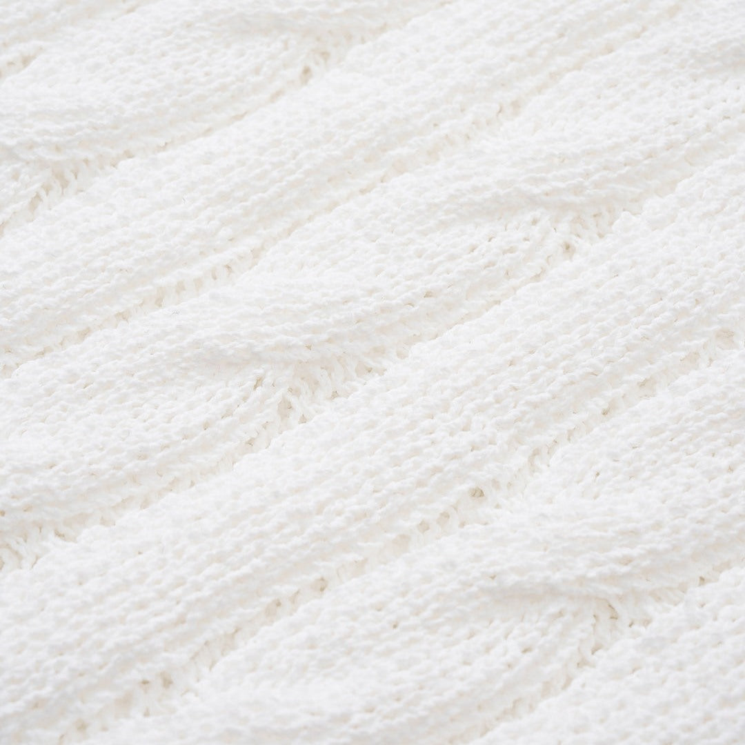 Kabelstickad minikjol med ribbad midja och randig nederkant