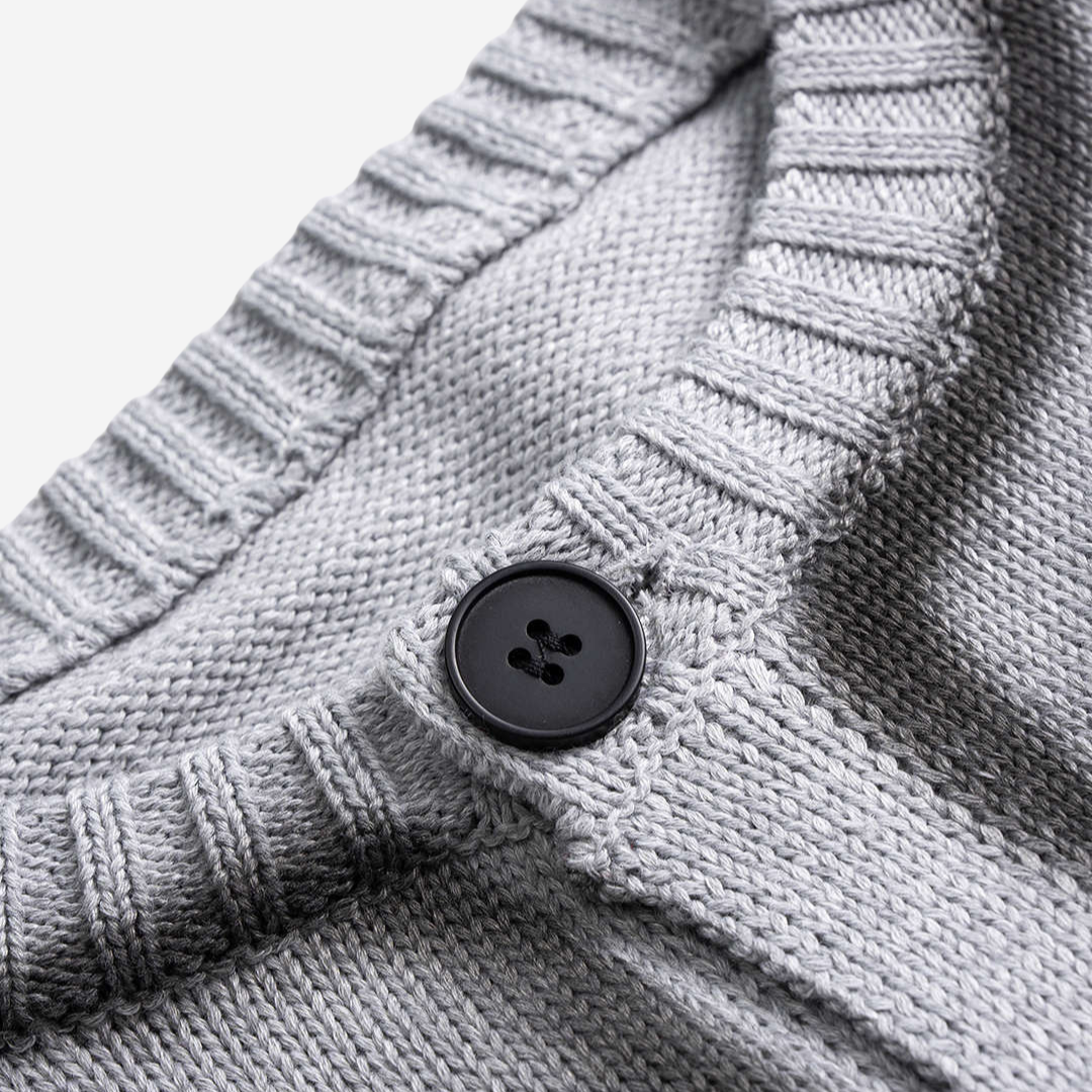 Ljusgrå Kofta med knappar och dekorativa fickor i stickad struktur
