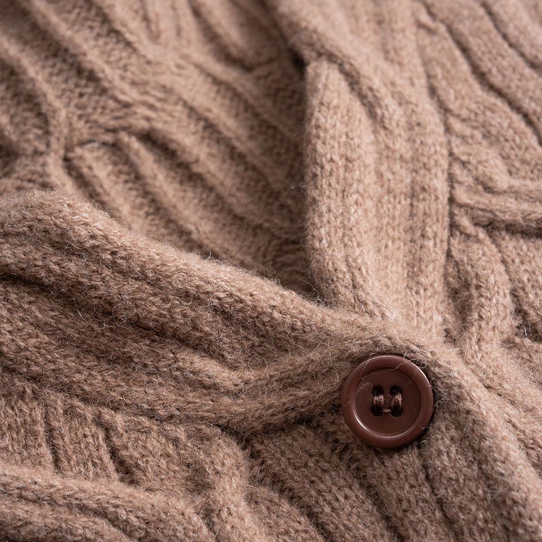 Rosabrun Stickad kofta med strukturmönster och avslappnad passform