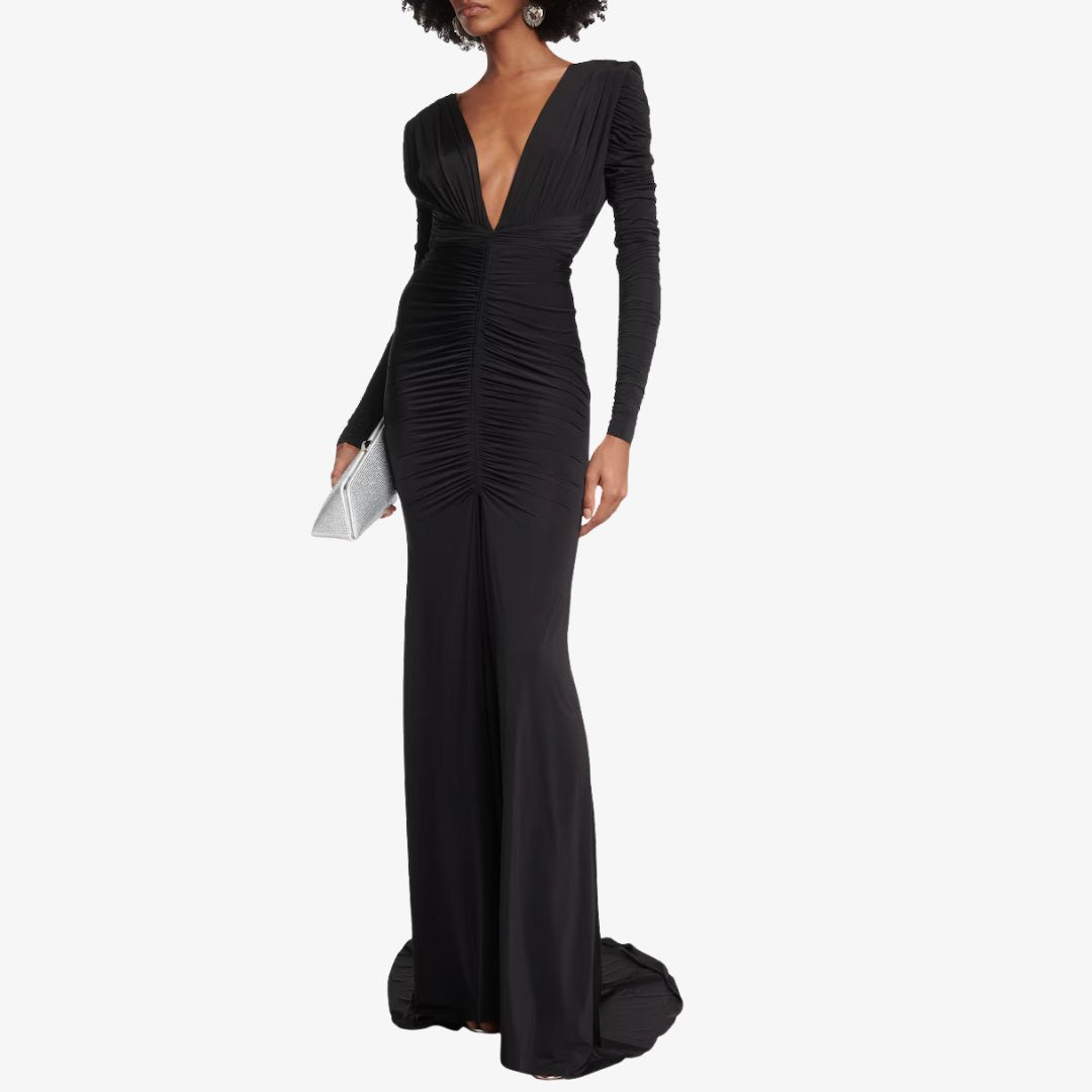 Golvlång stretchig maxiklänning i jersey med djup V-ringning, rynkdetaljer och långa ärmar