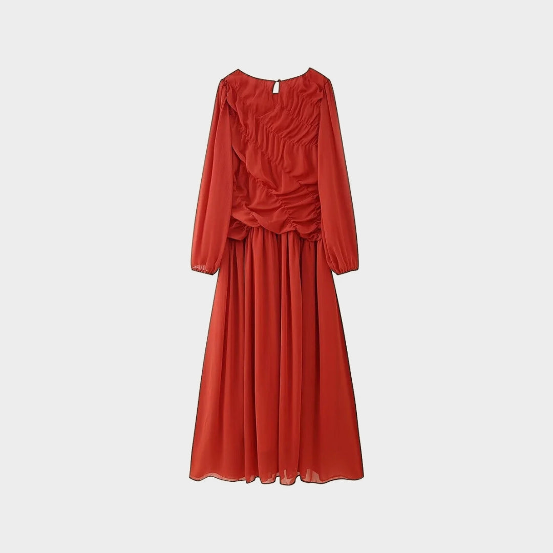 Lång klänning med rynkade detaljer och puffärm i vävt tyg