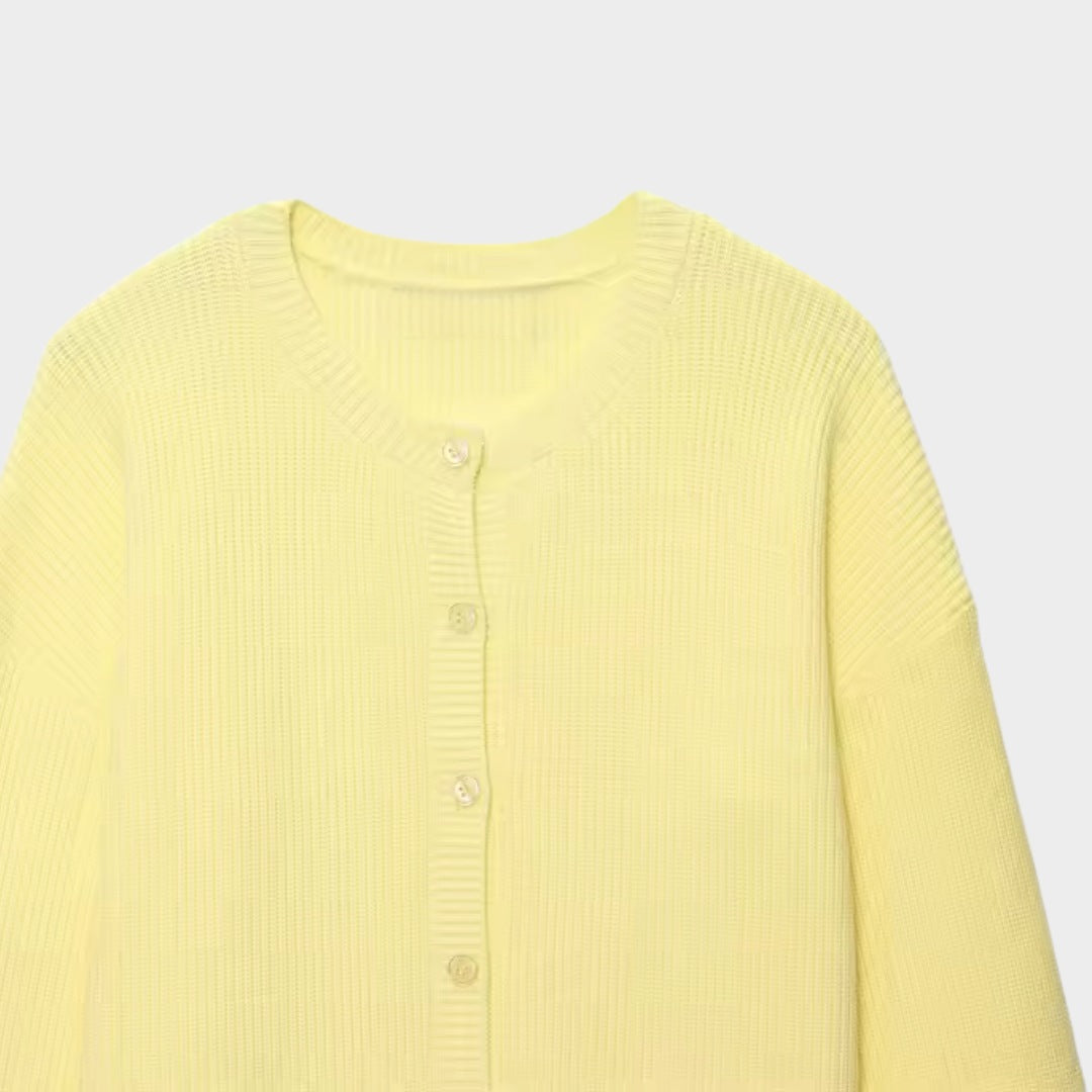 Gul stickad tröja med ballongärmar och knäppning