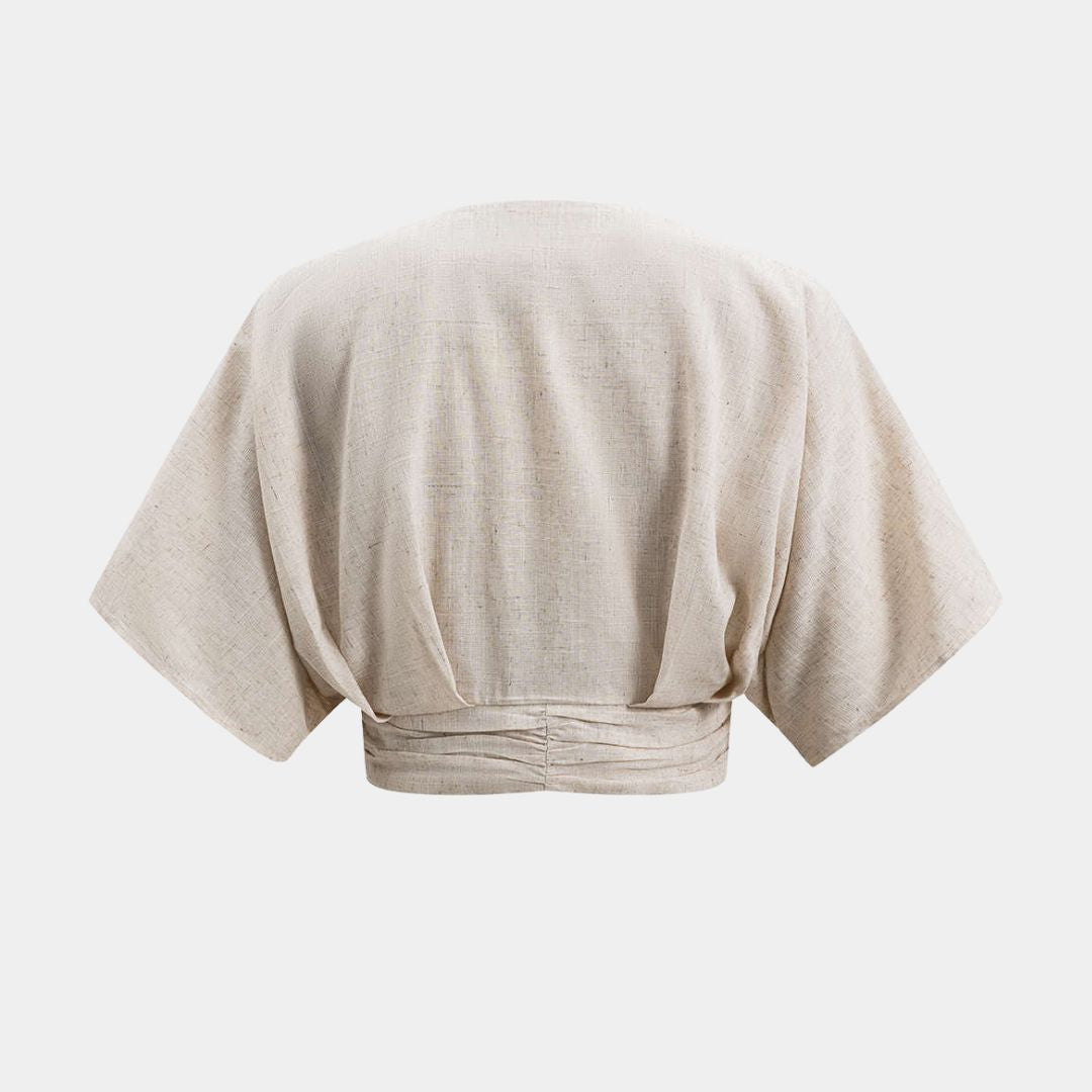 Kortärmad topp i linne med avslappnad passform och lätt struktur