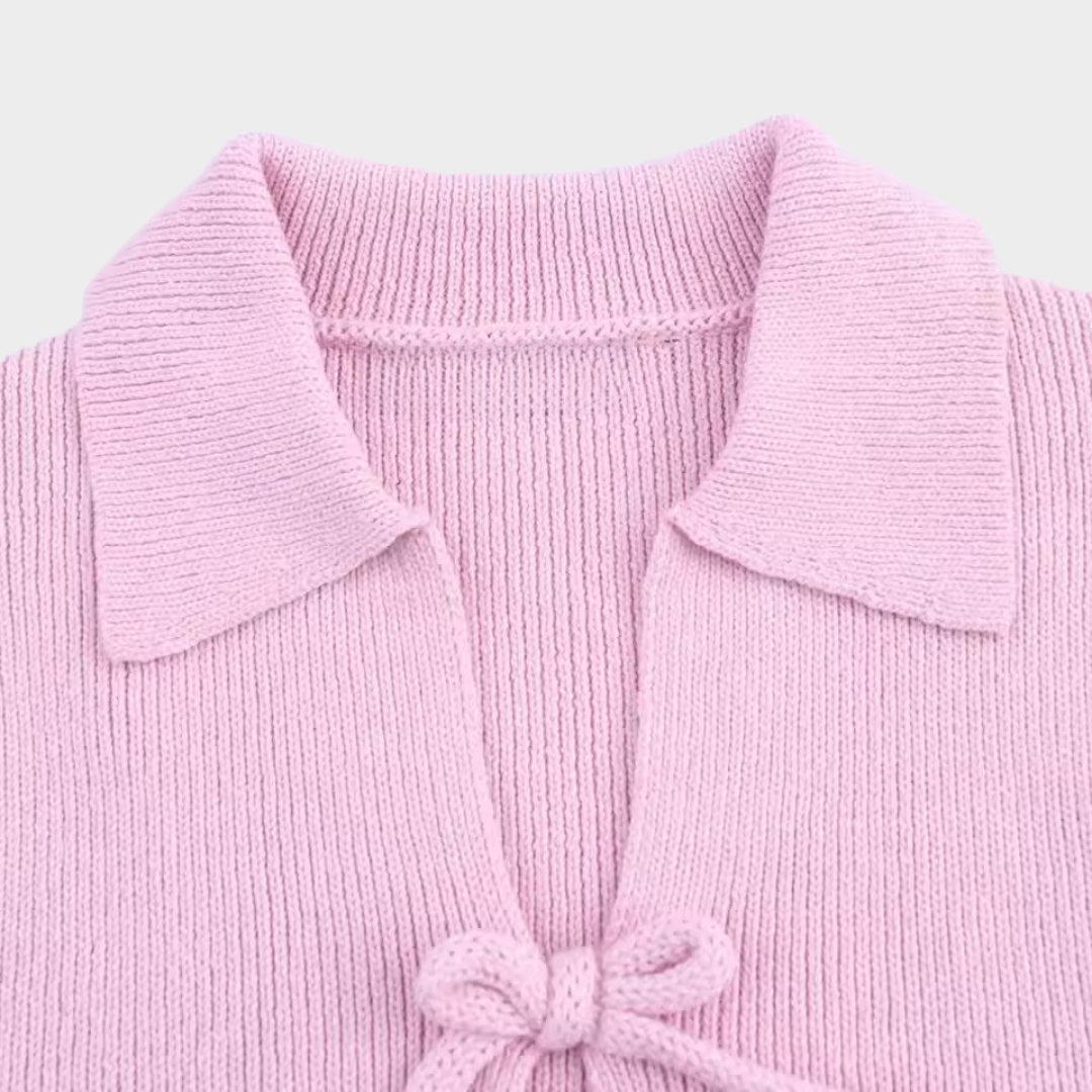 Rosa stickad kofta med rosettband kort ärm och smal passform