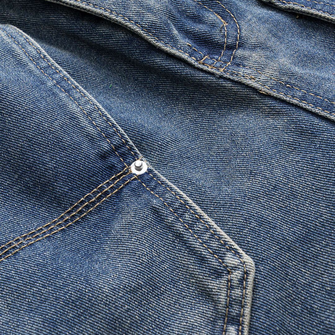 Blå cargojeans i denim med utanpåliggande fickor, lös passform och tvättad yta i bomullsblandning