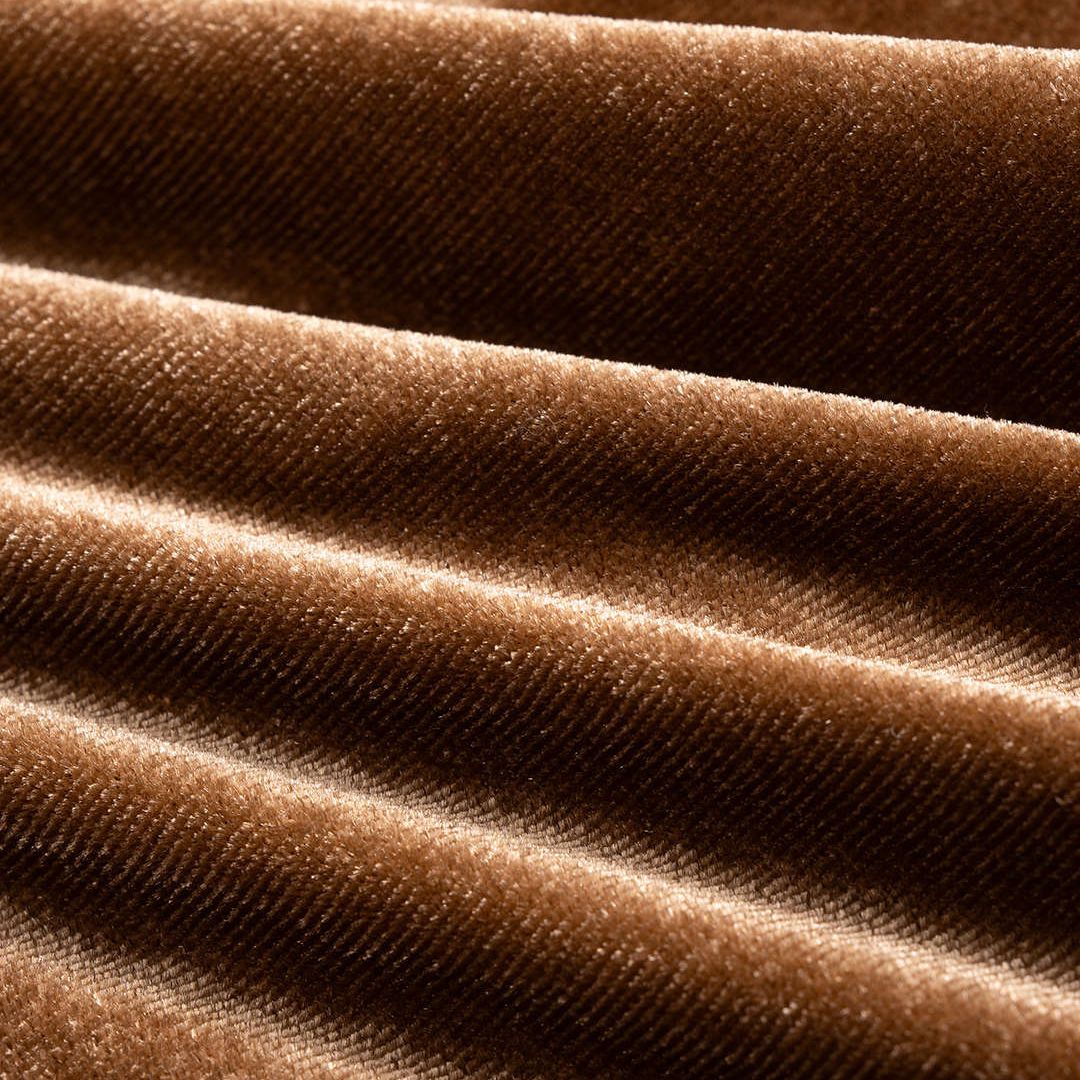 Brun sammetsblus med lång ärm och tvistad drapering i midjan