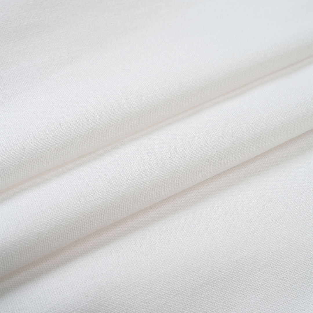 Vit linnemidiklänning med markerad midja, knytband och strukturerade ärmar – sommarklänning i viskos och linne