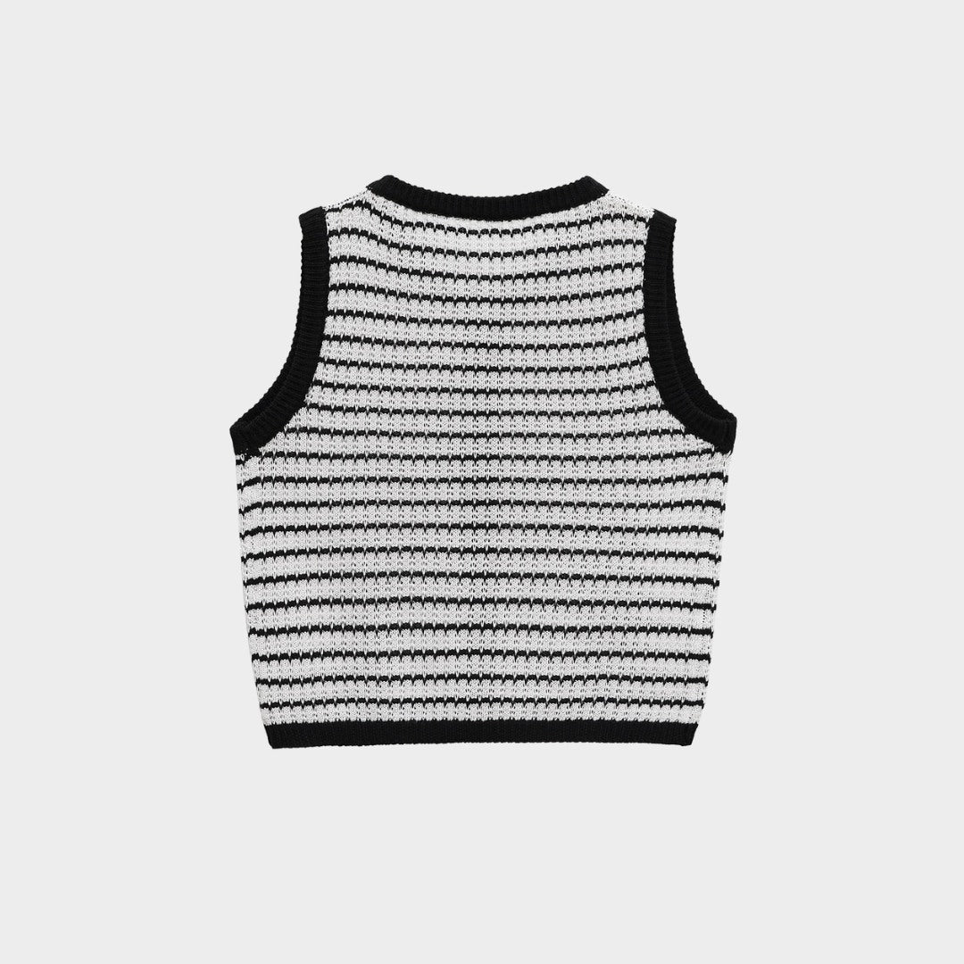 Vintageinspirerad stickad kofta med smala axelband och knappar