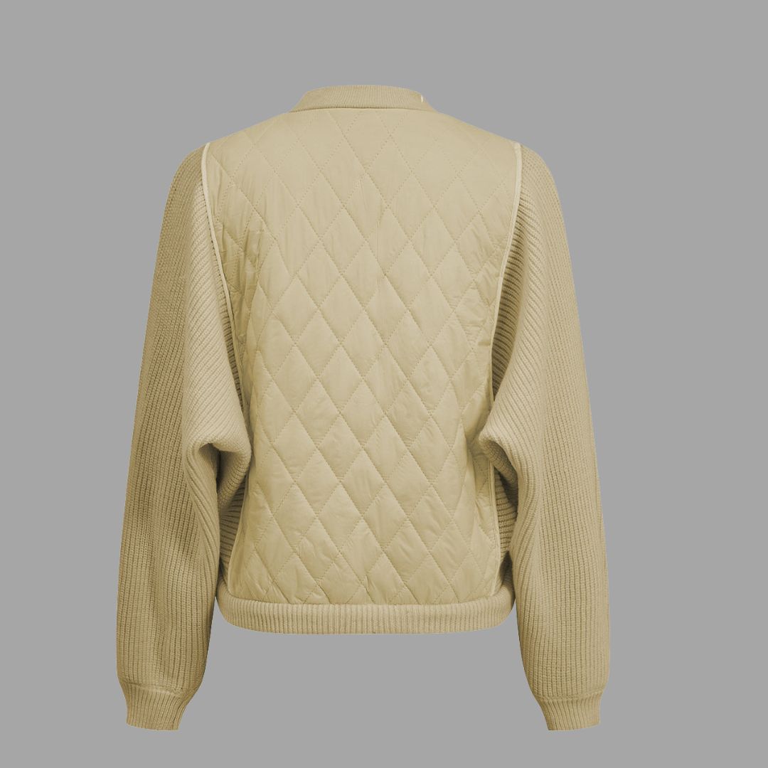 Fitted-passform quiltad stickad jacka med dragkedja och kontrasterande ärmar