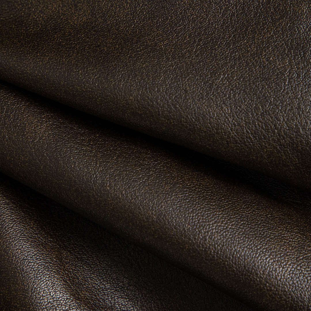 Kort breda axlar oversized jacka i veganskt läder med snörningsdetaljer och knytskärp