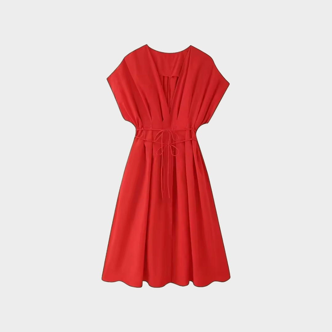 Midiklänning med omlottkänsla och resårmidja i vävt tyg