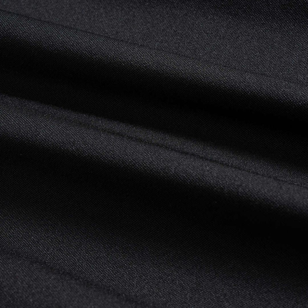 Svart långärmad midiklänning i stretchjersey med hög hals draperad midja och figurnära passform