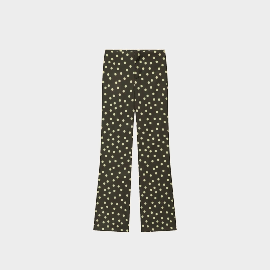 Tvådelat set med asymmetrisk topp och vida byxor – enfärgat eller prickigt