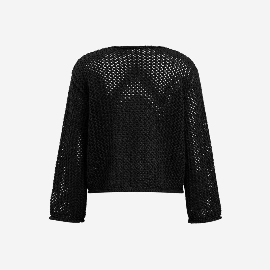 Stickad kofta i virkad struktur med fickor och stora dekorativa knappar