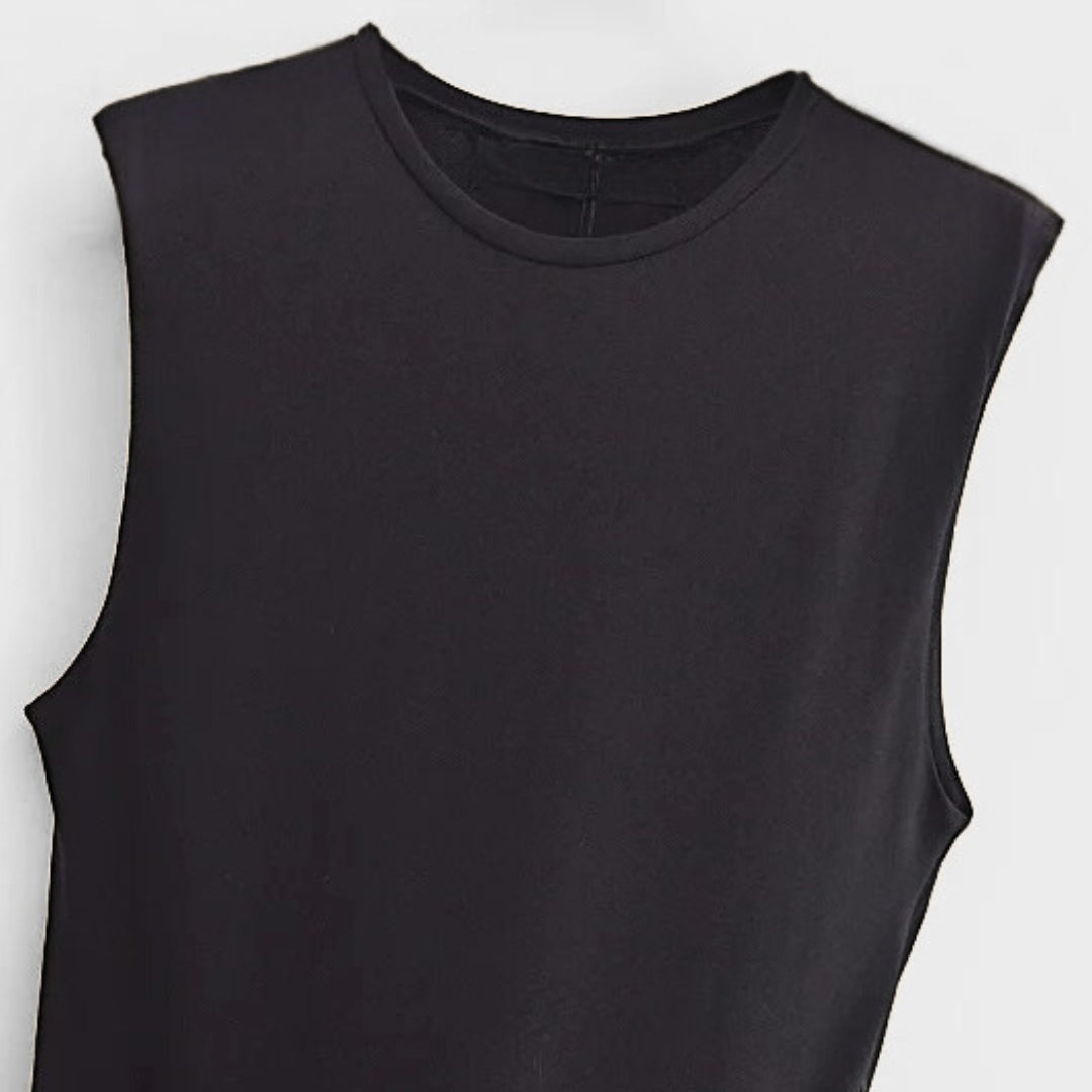 Ärmlös klänning med rynkad midja och veckad kjol i tvådelad look