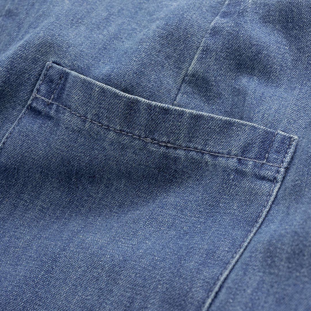 Blå omlottinspirerade denimbyxor med knytband i midjan, vida ben och sömdetaljer över knäna