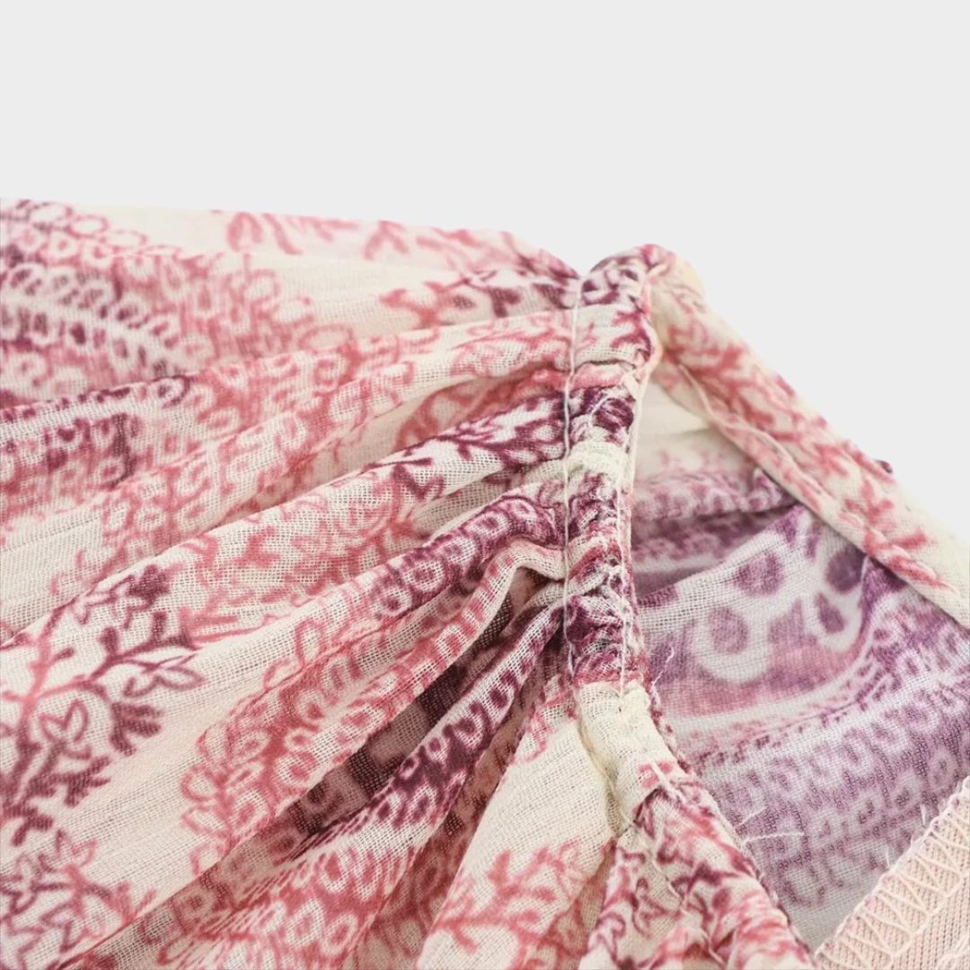 Lång paisleymönstrad klänning med volymärmar och lagerdetalje