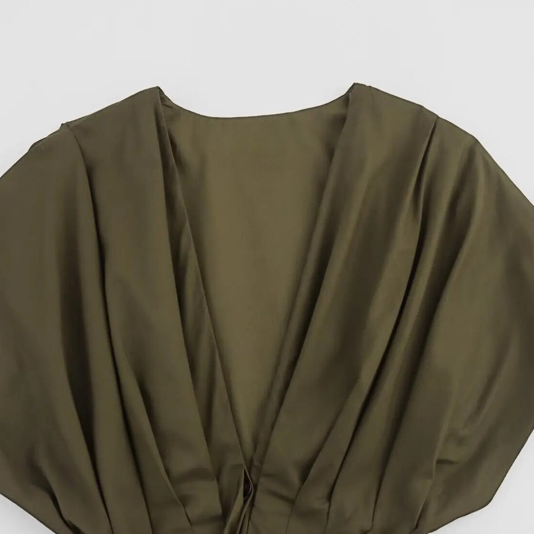 Midiklänning med omlottkänsla och resårmidja i vävt tyg