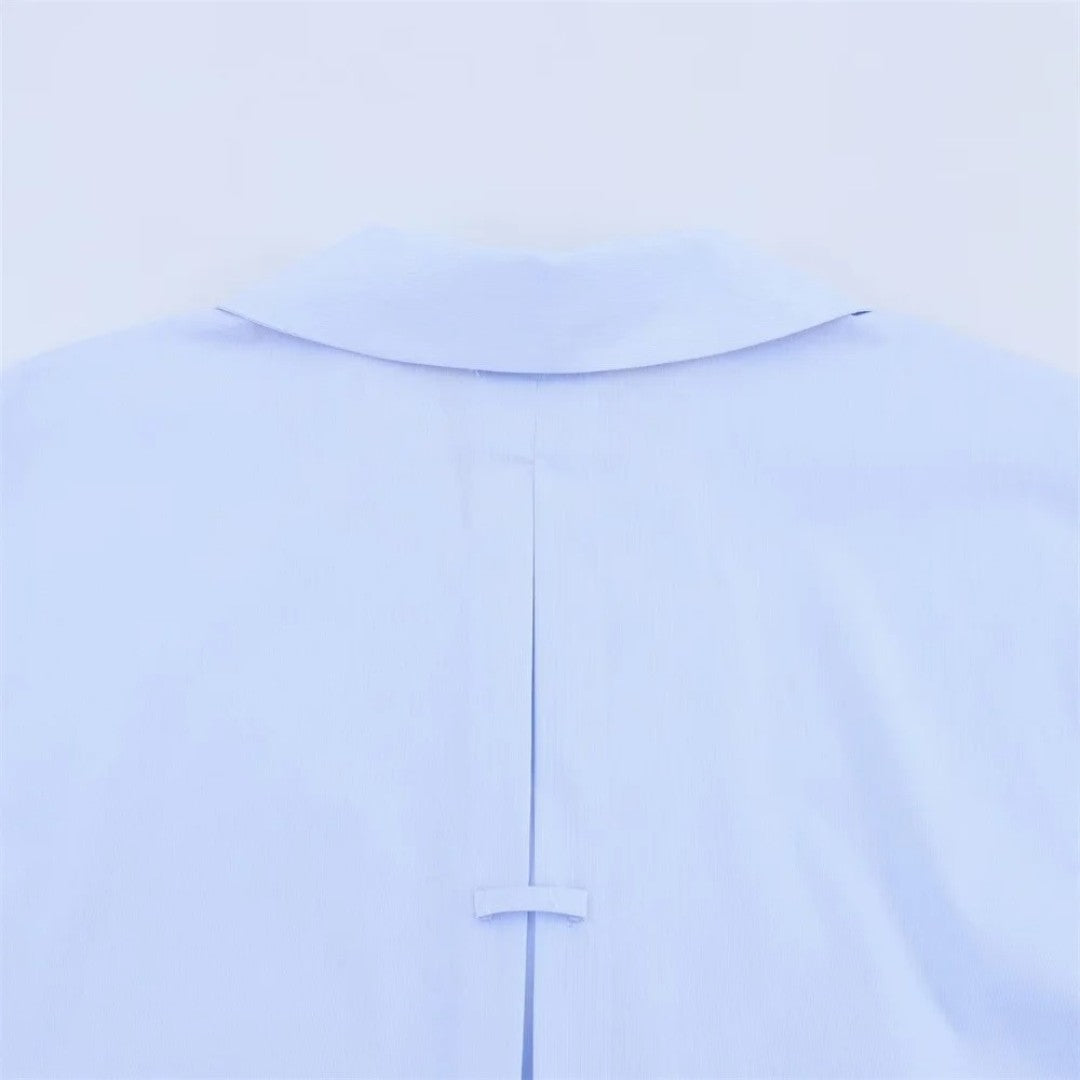 Oversize skjorta med knappstängning och uppvikta ärmar