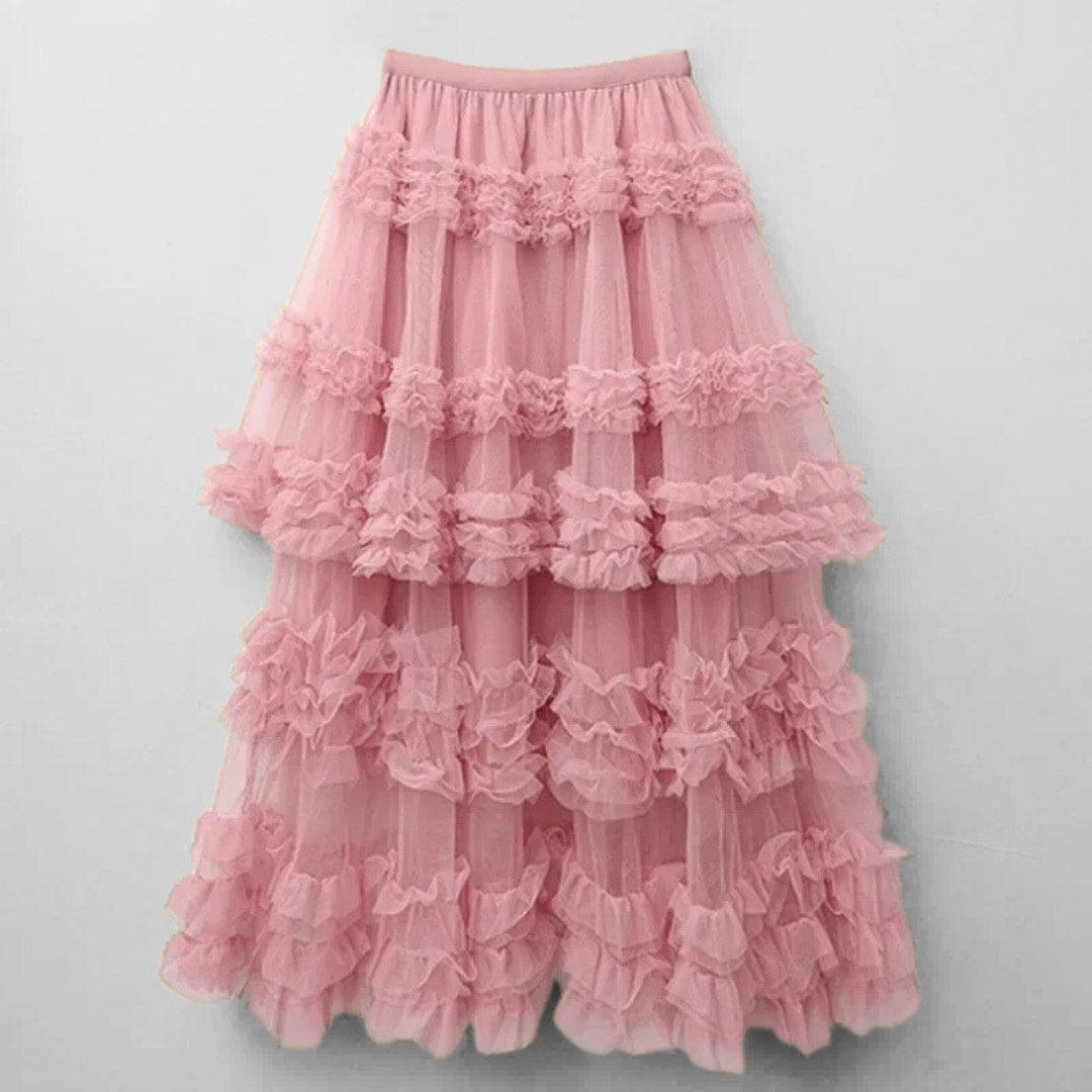 Kjol i spets med lagerdetaljer, naturlig midja, A-linje silhuett och volym