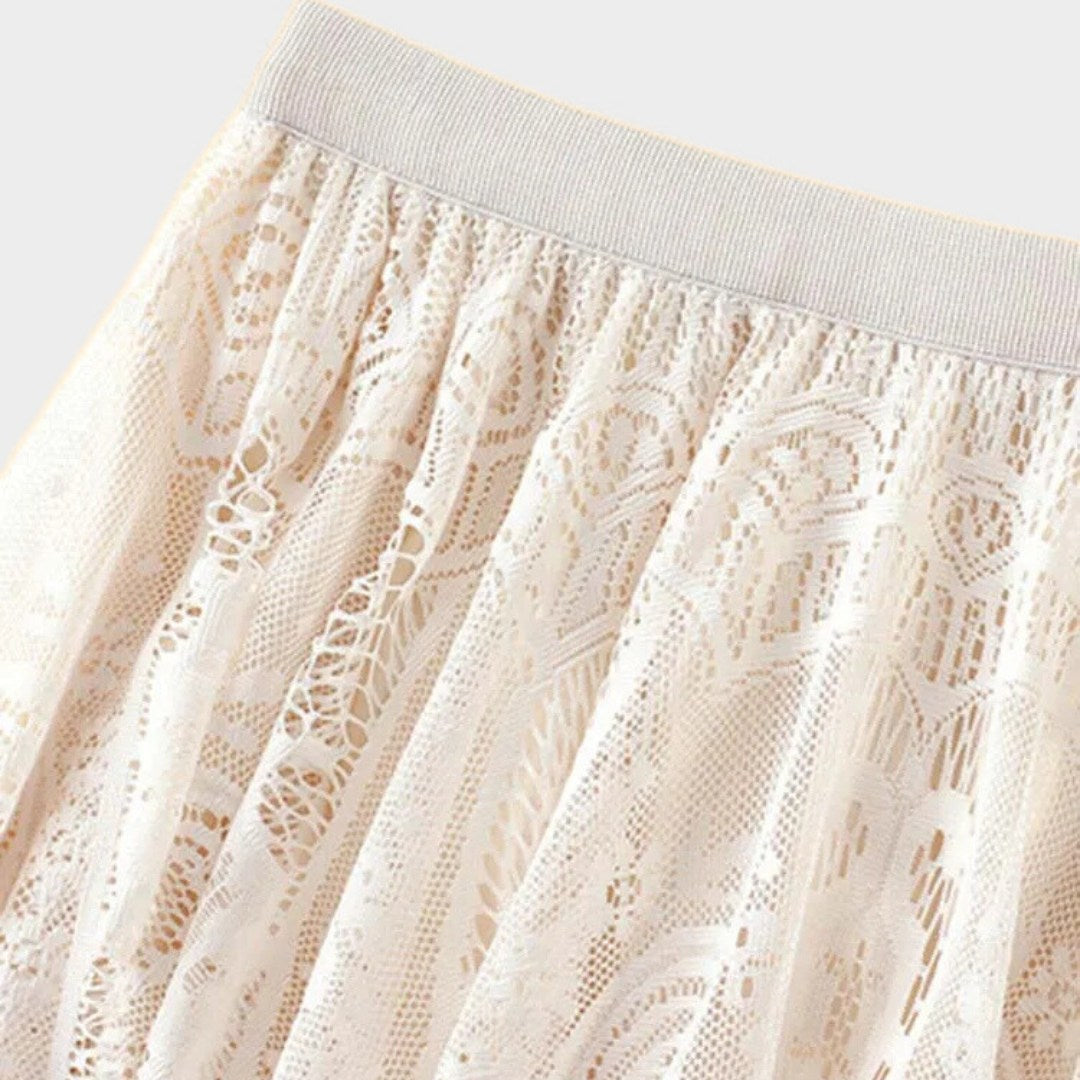 Kjol i spets med naturlig midja, ankellängd, A-linje silhuett och delikat struktur