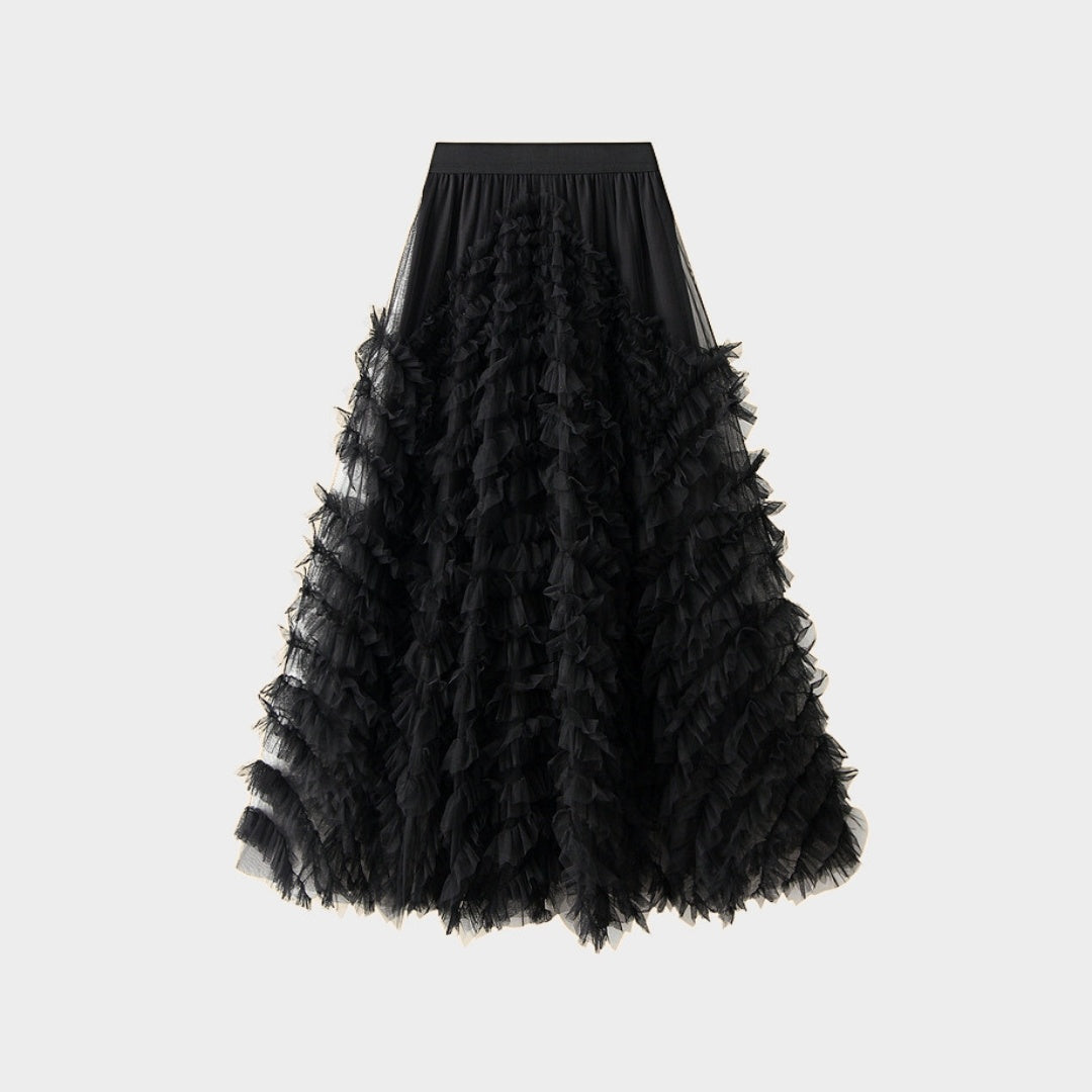 Kjol i mesh med volanger empiremidja A-linje silhuett och lagerstruktur