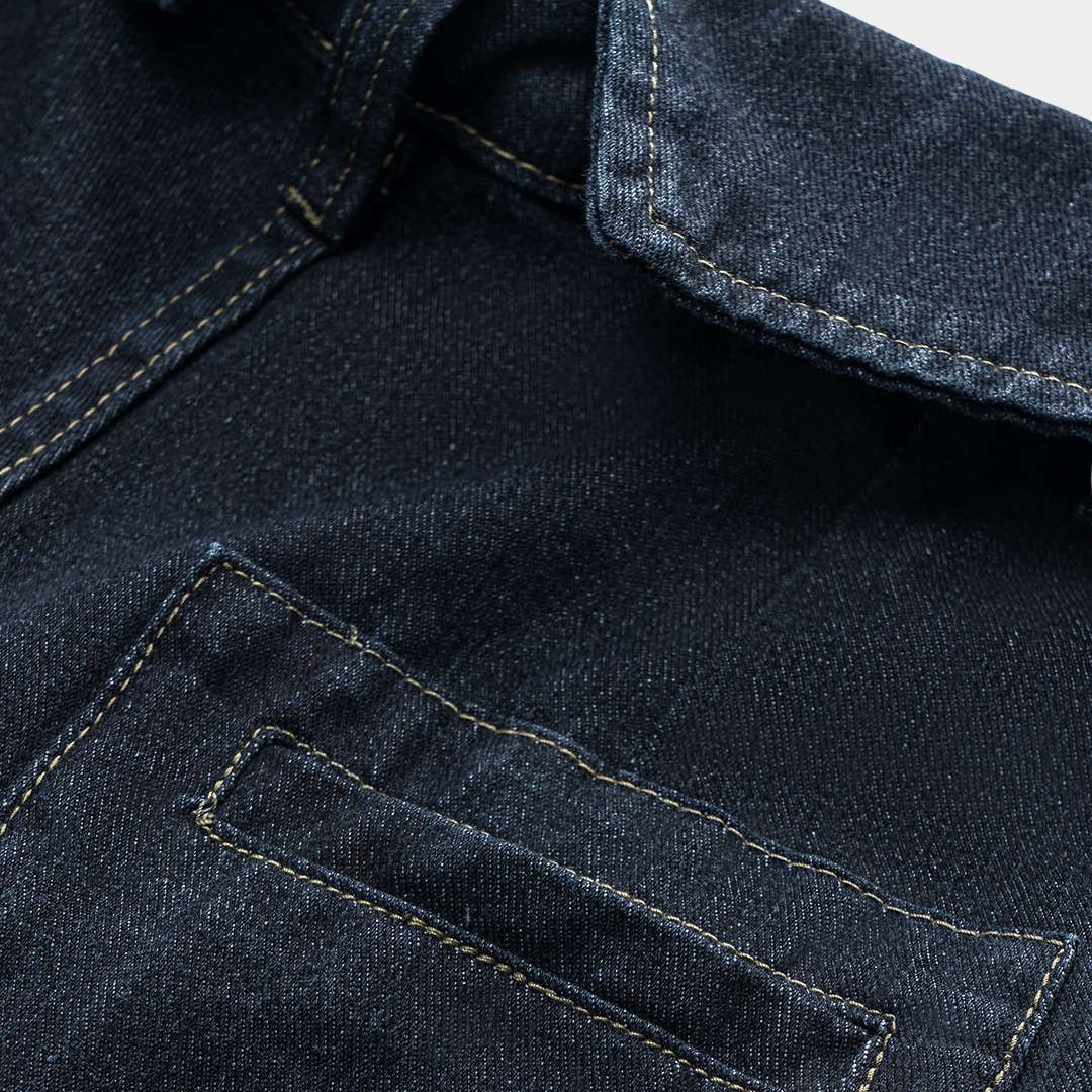 Mörkblä vida jeans med unik skjortkrage i midjan, bred silhuett och klassisk denimstruktur utan stretch