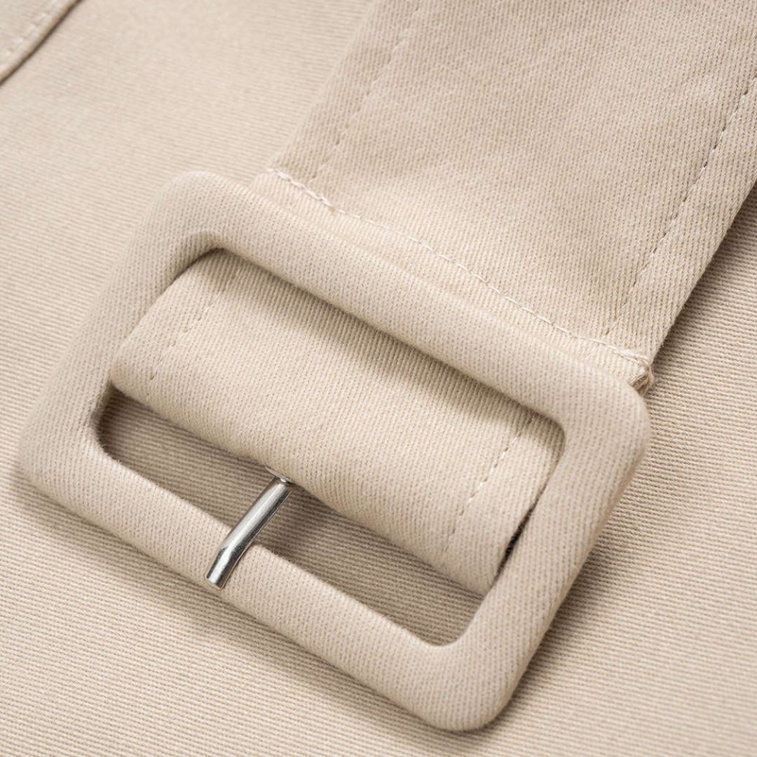 Beige utilityjacka i vävd twill med bälte fickor och voluminösa ärmar
