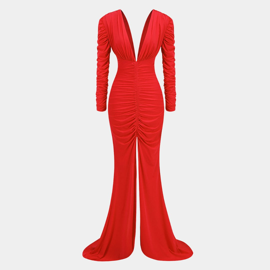 Golvlång stretchig maxiklänning i jersey med djup V-ringning, rynkdetaljer och långa ärmar