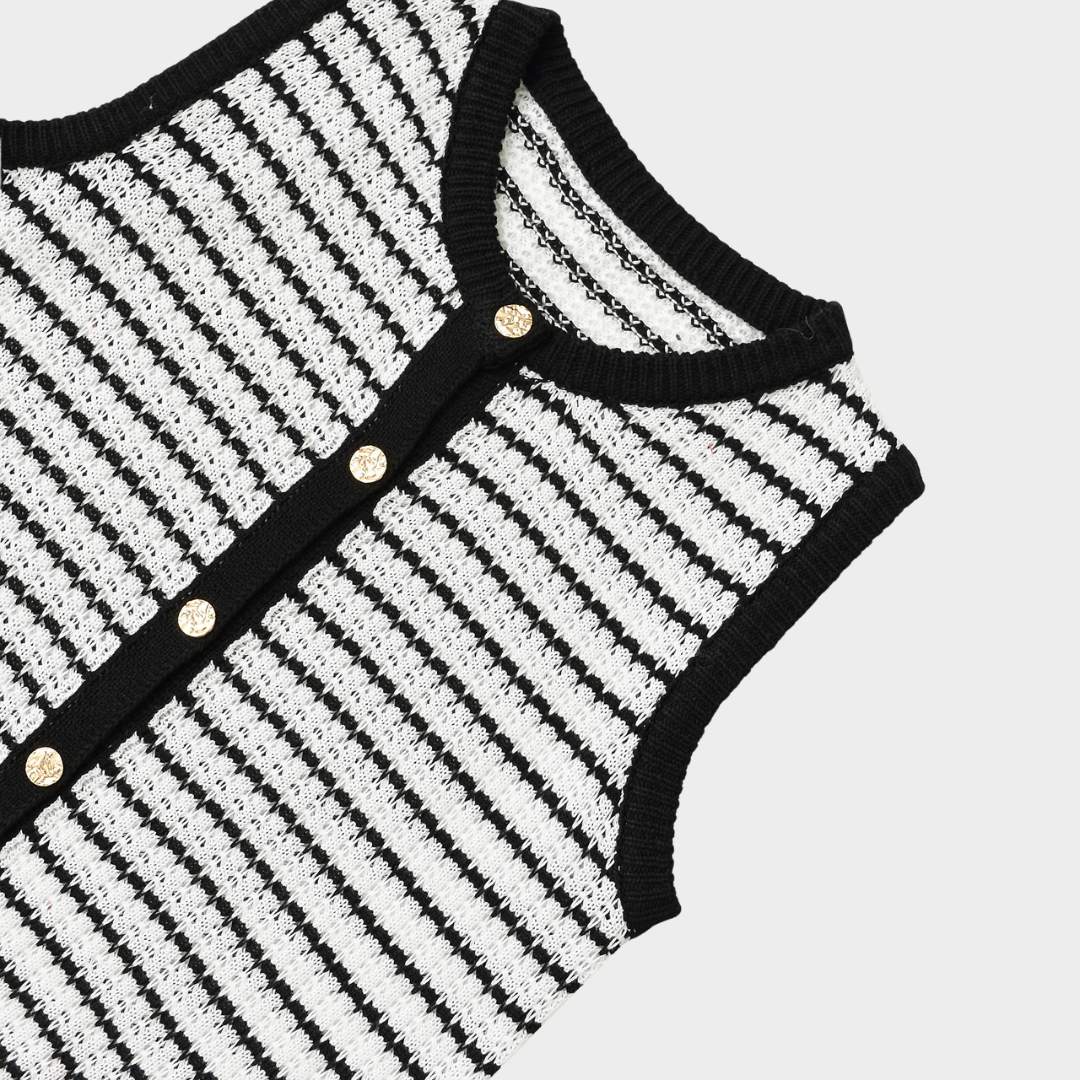 Vintageinspirerad stickad kofta med smala axelband och knappar