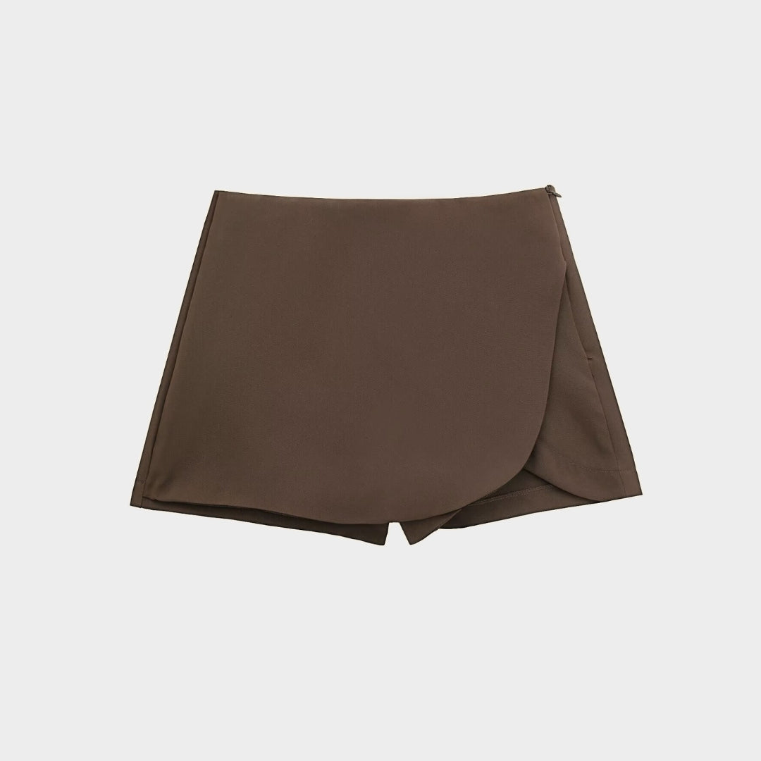 Asymmetrisk miniskort med omlott design och hög midja