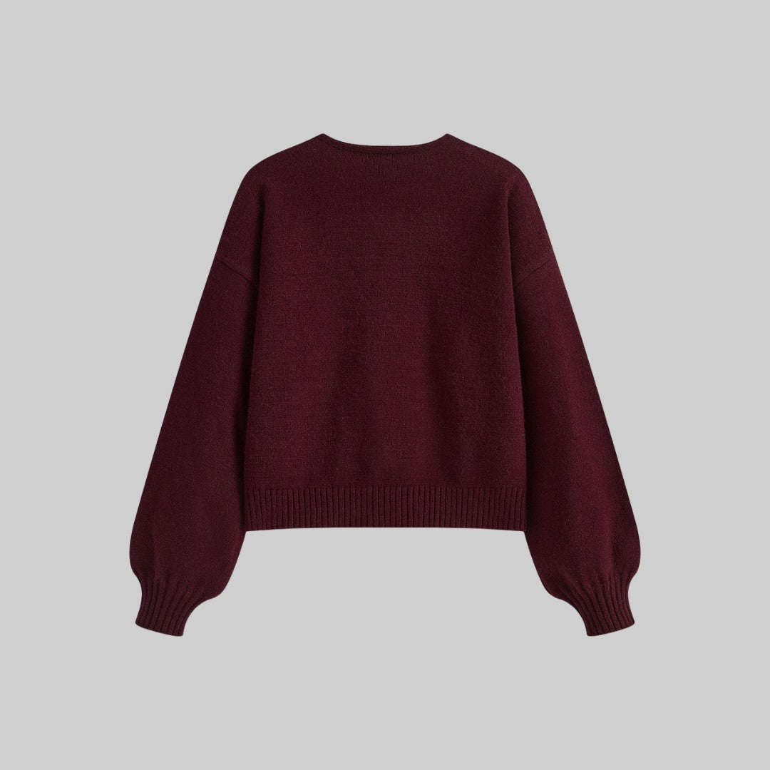 Stickad cardigan med sammetsrosetter och ballongärmar i mjuk stretchkvalitet