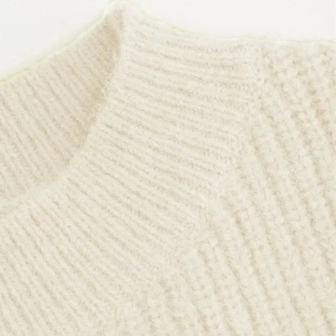 Stickad tröja med blommig brodyr och ballongärm