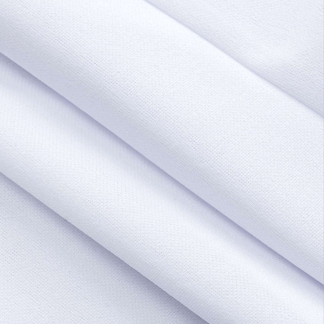 Vit långärmad topp med snörning i ryggen och pärlknappar framtill