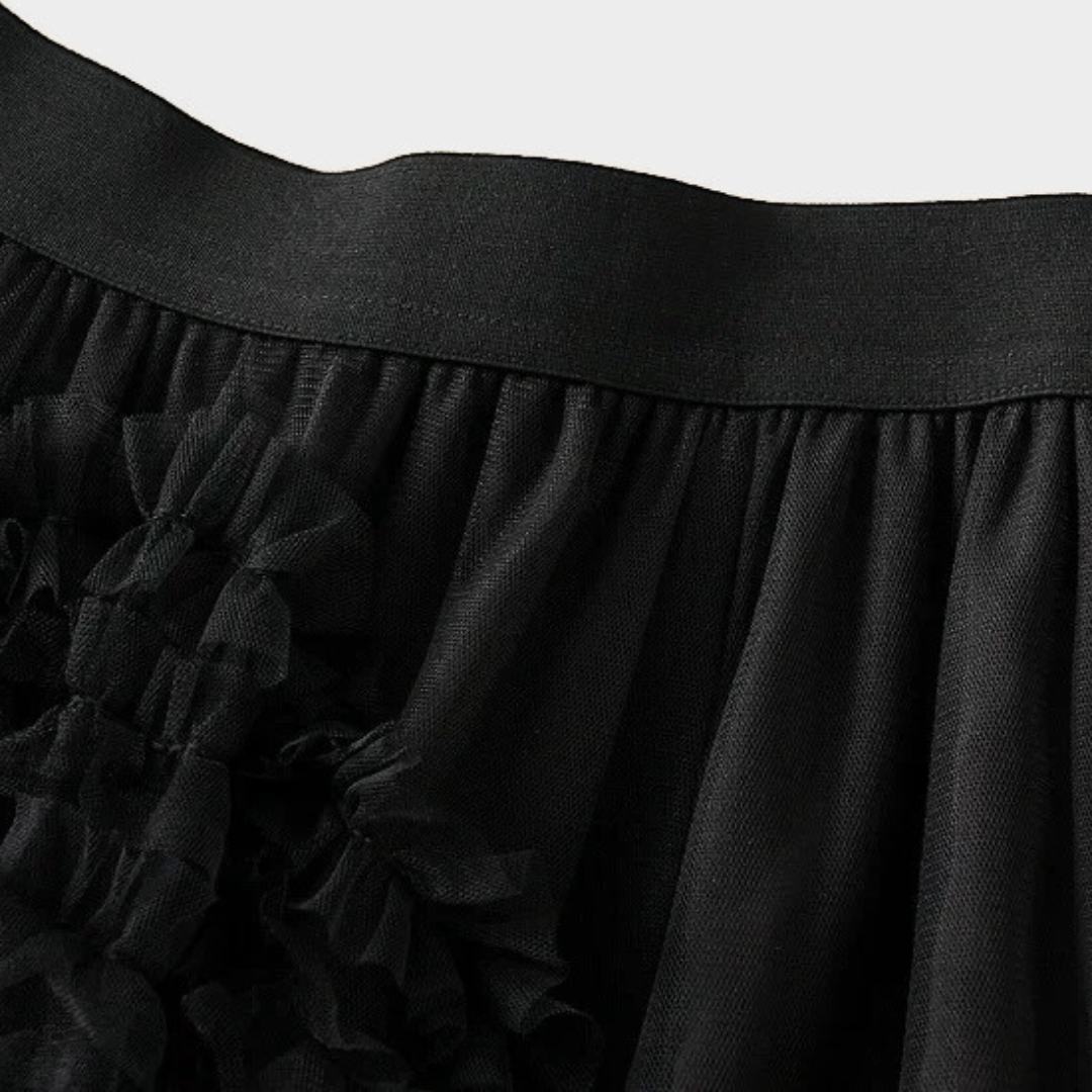 Kjol i mesh med volanger empiremidja A-linje silhuett och lagerstruktur