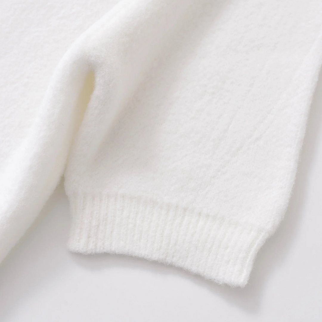 Kortärmad stickad kofta med rosettdetaljer och knappstängning