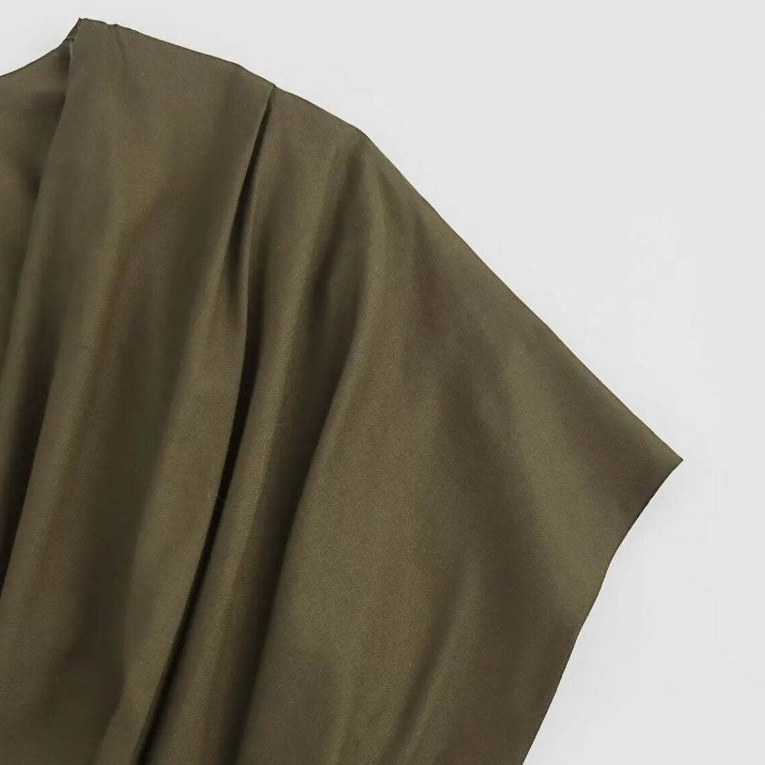 Midiklänning med omlottkänsla och resårmidja i vävt tyg