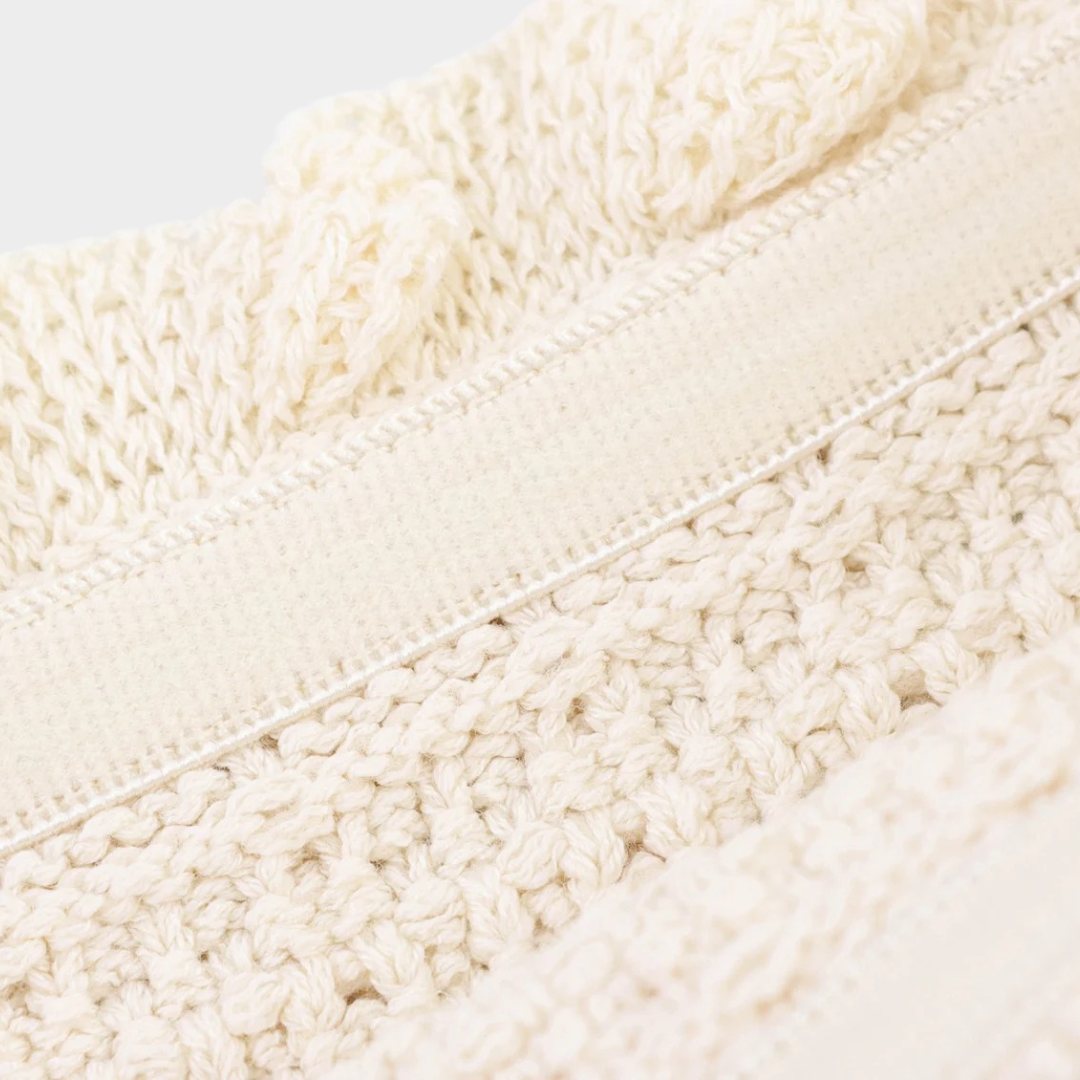 Tvådelad set med kortärmad kofta och midikjol i stickad bomullsblandning