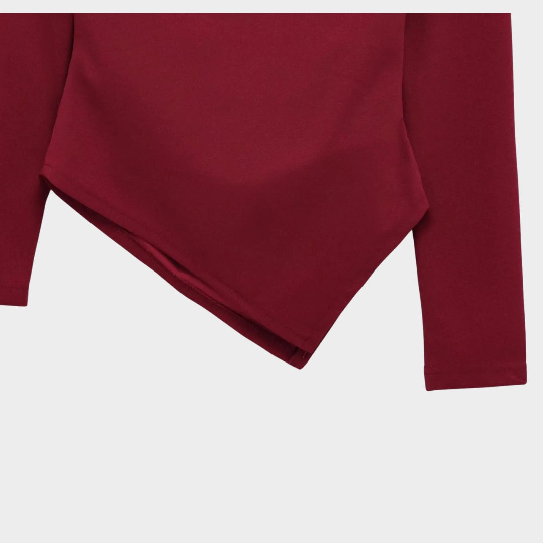 Asymmetrisk damtopp med lång ärm och kort längd
