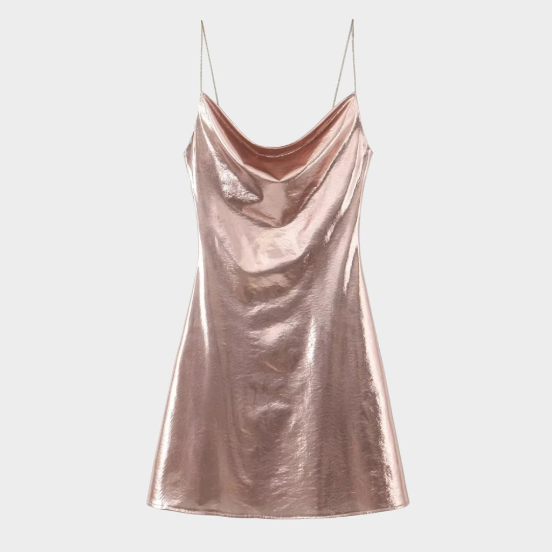 Glittrande miniklänning med smala axelband och öppen rygg