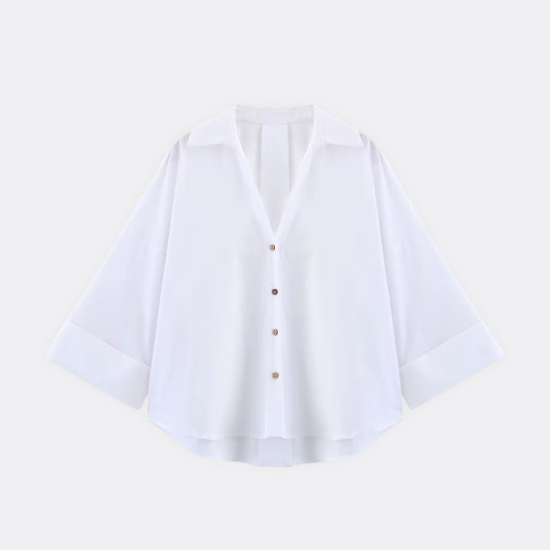 Oversize skjorta med knappstängning och uppvikta ärmar