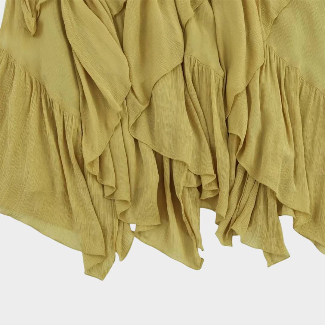 Midilång volangkjol i senapsgul med asymmetrisk fåll och A-linjeform