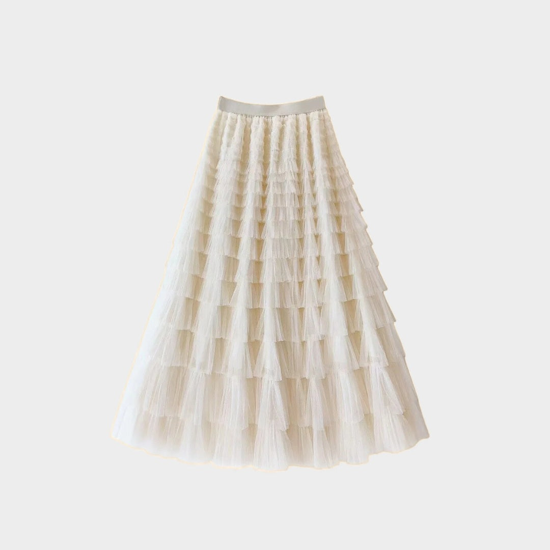 Kjol i mesh med plisserade lager naturlig midja och avslappnad passform