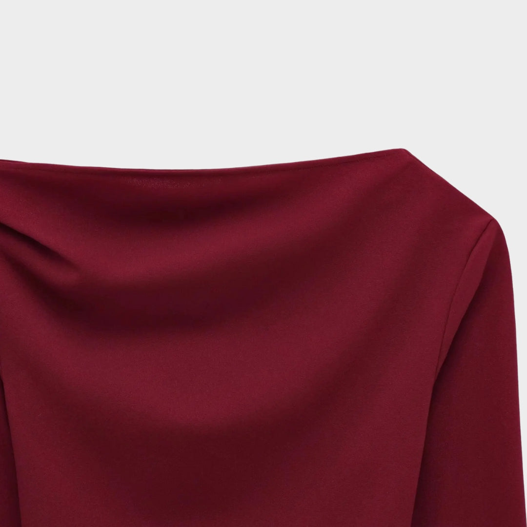 Asymmetrisk damtopp med lång ärm och kort längd